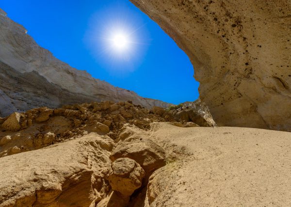 Wide angle shot of Sykia Cave sinkhole and entrance in Melos Island, Greece